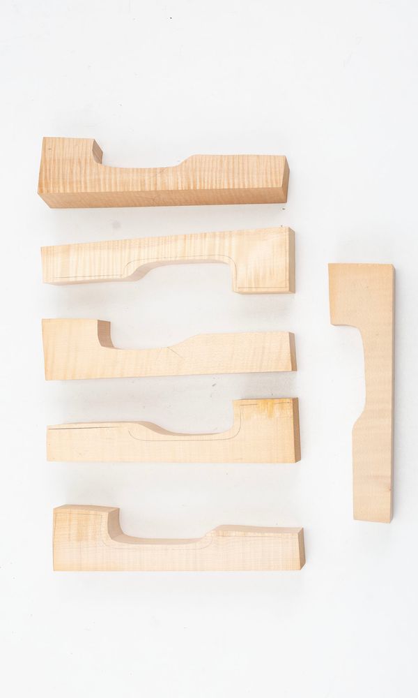 Six violin neck graft blanks, maple (partially made)