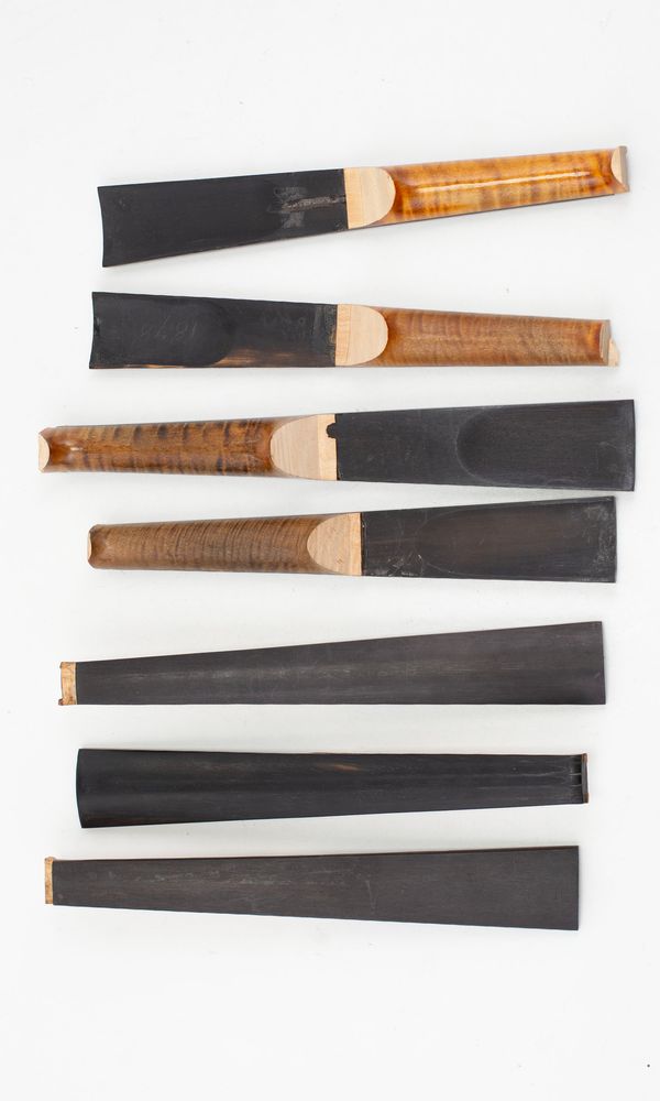 Seven violin fingerboards, ebony (used)