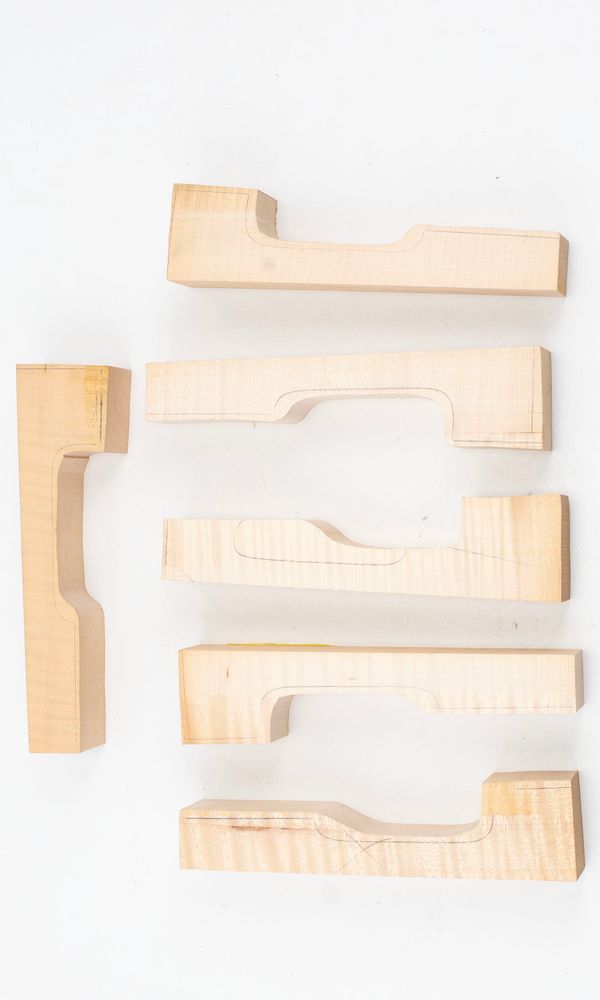 Six violin neck graft blanks, maple (partially made)