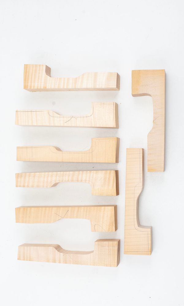 Eight violin neck graft blanks, maple (partially made)