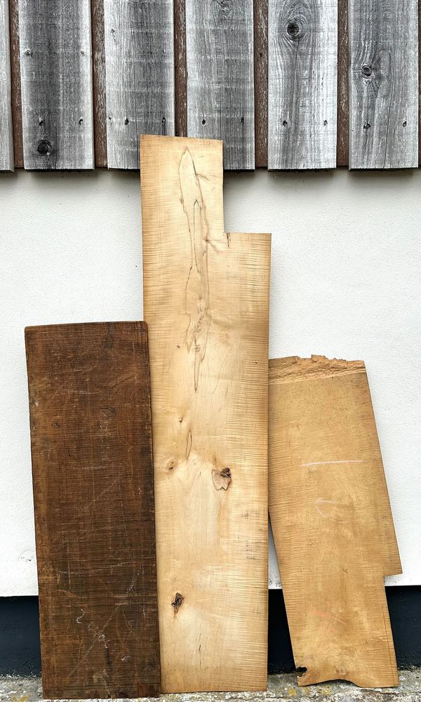 An assortment of wood for cello repair