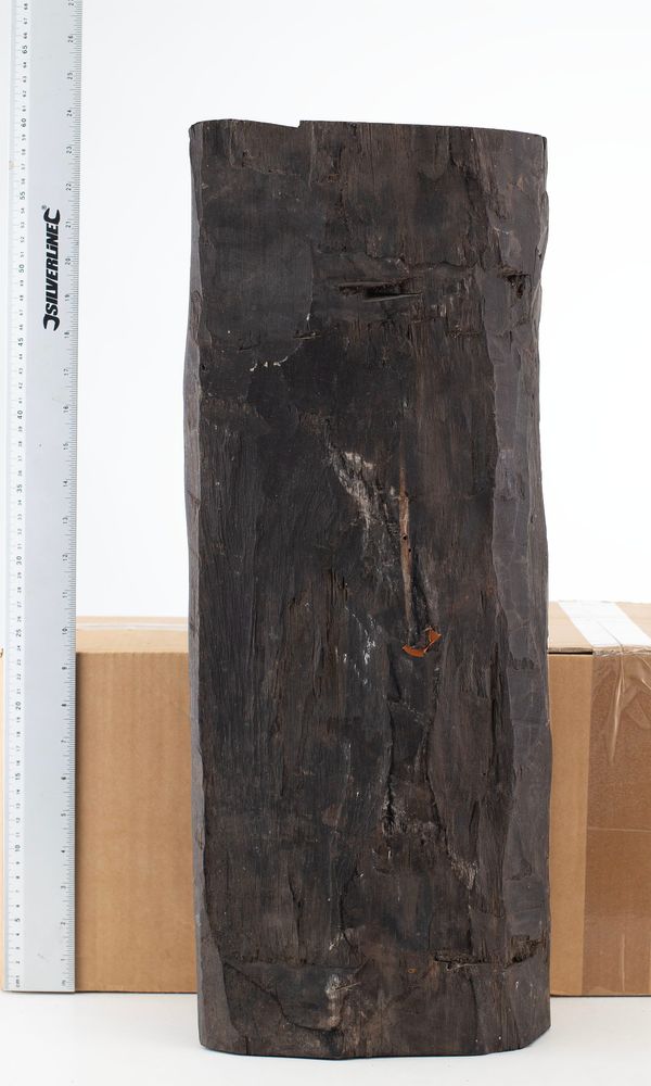 A large block of wood, ebony