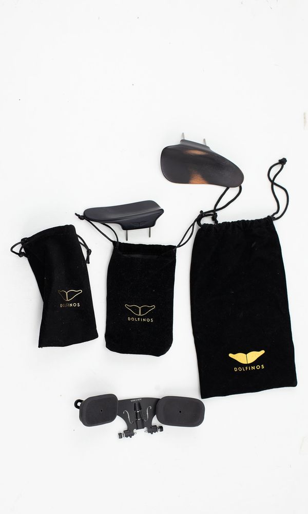 A violin shoulder / chin rest kit, branded Dolfinos