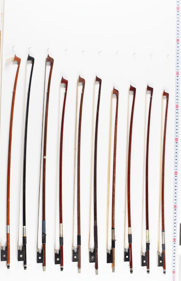 Twenty child violin bows, various lengths