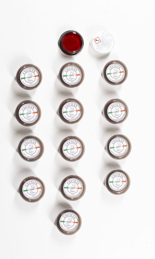 A bundle of nine violin rosins, three viola rosins and three cellos rosins, branded Cecilia