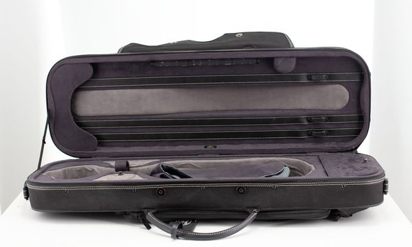 A violin case, branded Pedi