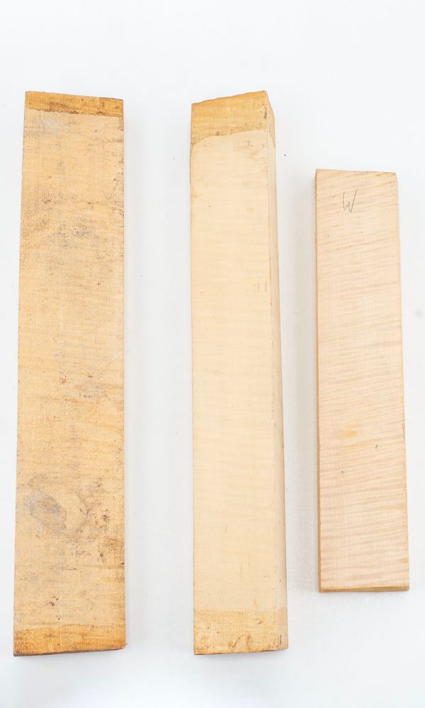 Three violin neck blocks, maple