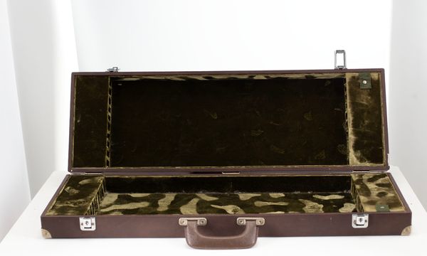 A twenty-slot bow case, unbranded