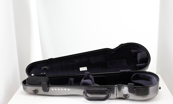 A violin case, branded Bam