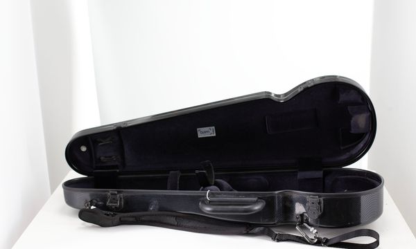 A violin case, branded Bam