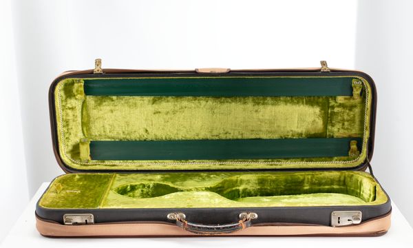 A bundle of three violin cases