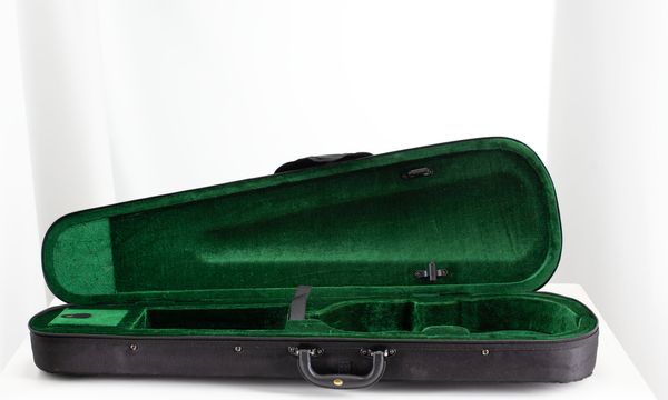 A bundle of three violin cases