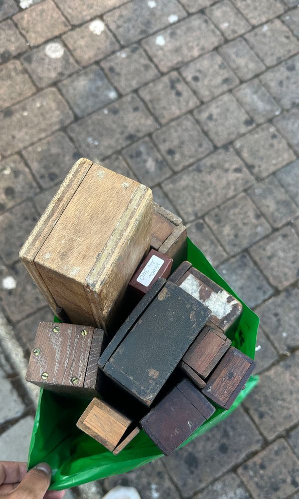 A bundle of old bow cases