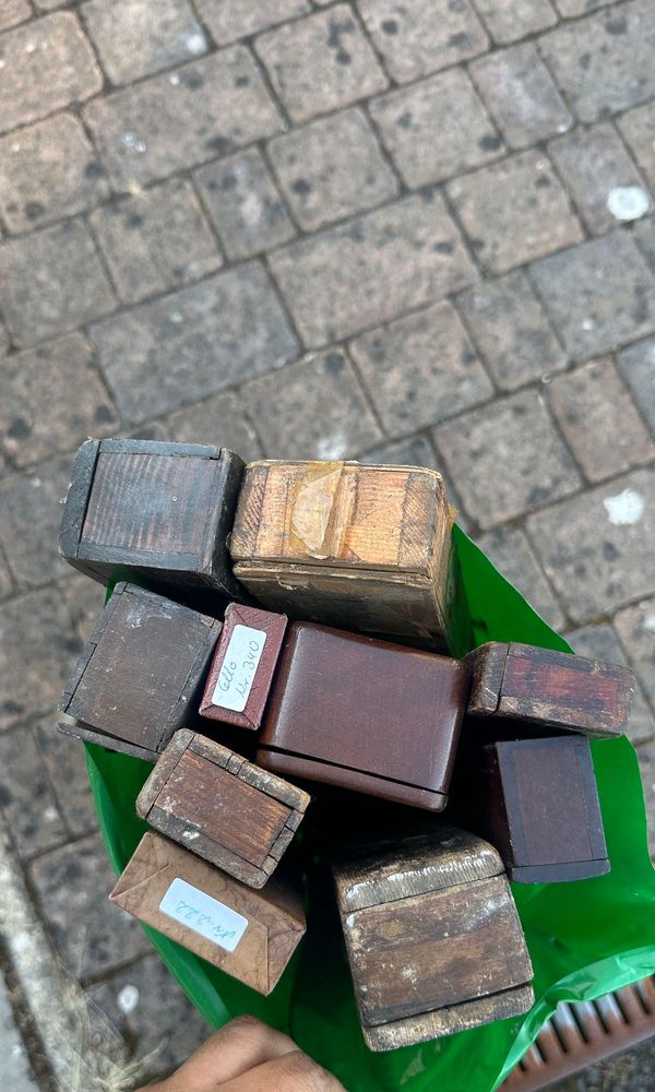 A bundle of old bow cases