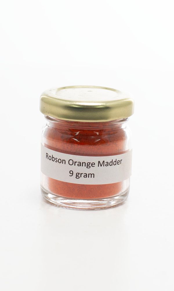 A jar of orange madder