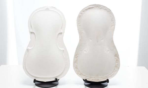 Six violin plaster casts
