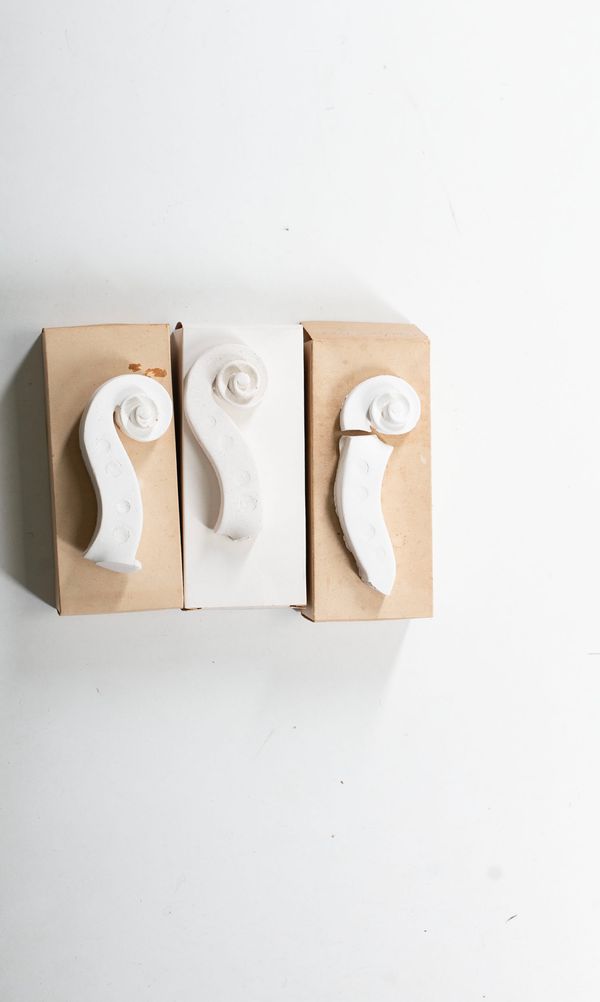 Three Guadagnini scrolls casts