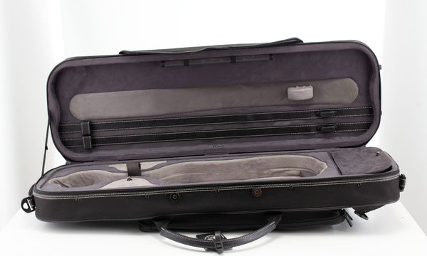 A violin case, branded Pedi