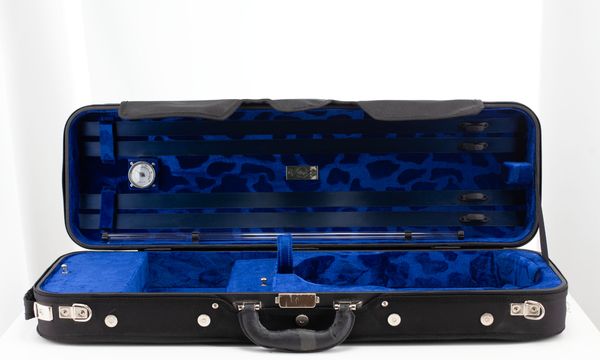 A violin case, branded Negri