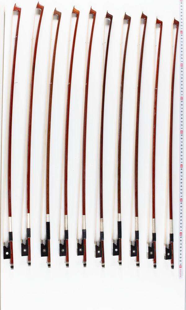 A bundle of ten violin bows, varying sizes