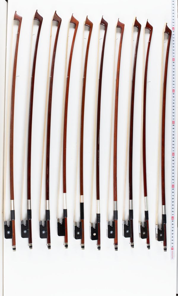 A bundle of eleven  cello bows, varying sizes