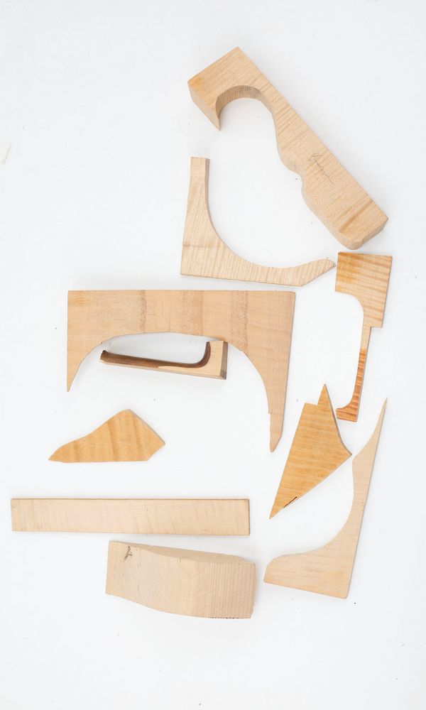 An assortment of wood offcuts, maple