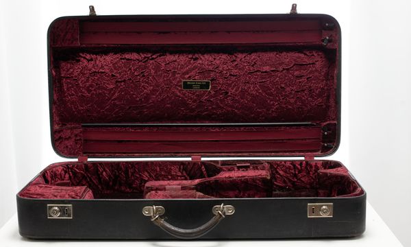 A double case for violin and viola, branded Paxman Cases