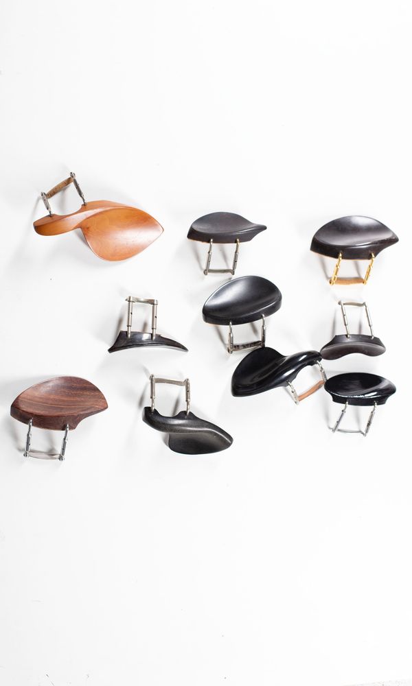 A bundle of ten chinrests, varying sizes