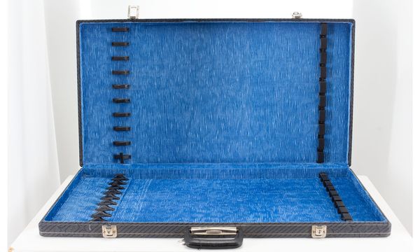 A twenty-slot bow case, unbranded