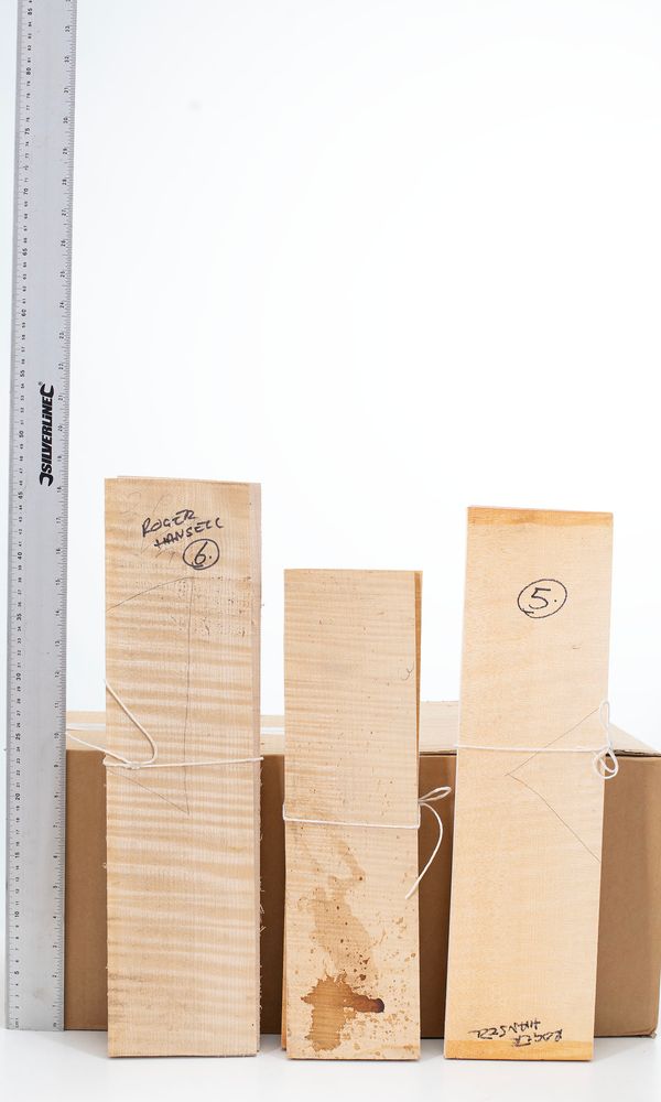 Three maple violin backs