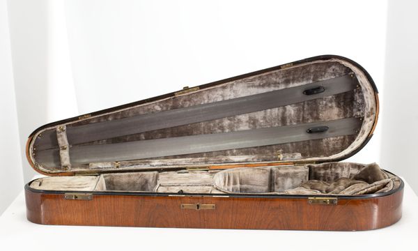 A violin case, branded W. E. Hill & Sons