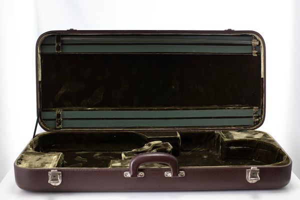 A viola and violin case, branded Jaeger