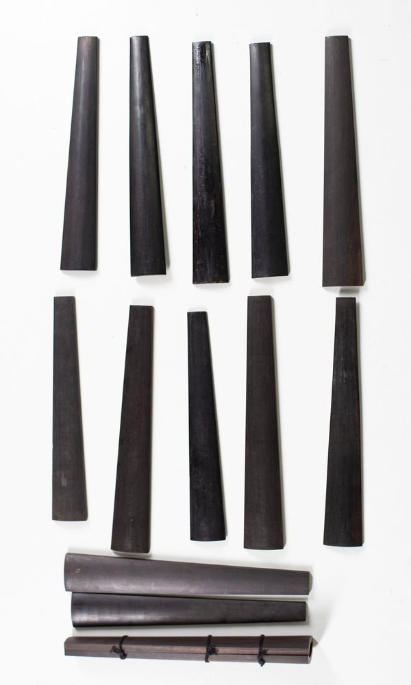 A bundle of fourteen 4/4 sized violin fingerboards
