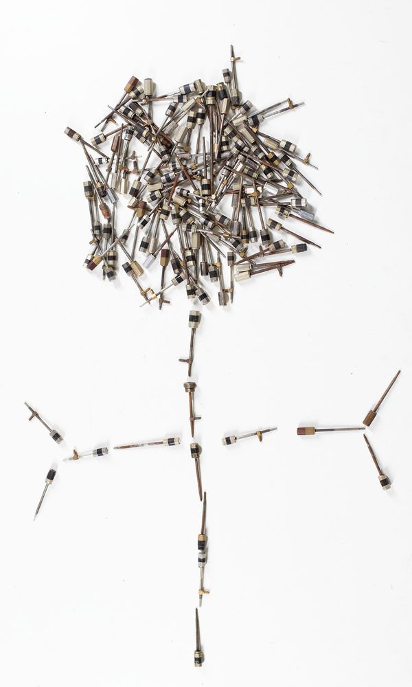 A bundle of nickel-mounted bow adjusters