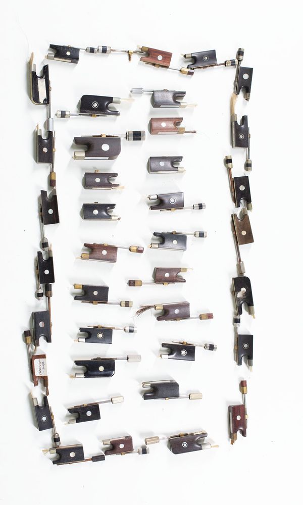 A bundle of bow frogs, varying sizes