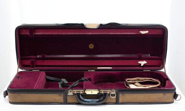 A violin case, branded Gordge