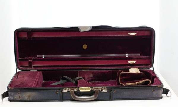 A violin case, branded Gordge