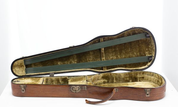 A violin case, branded W. E. Hill and Sons