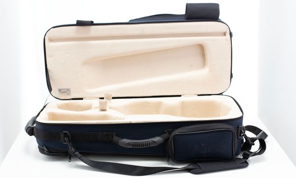 A violin case, branded Bam