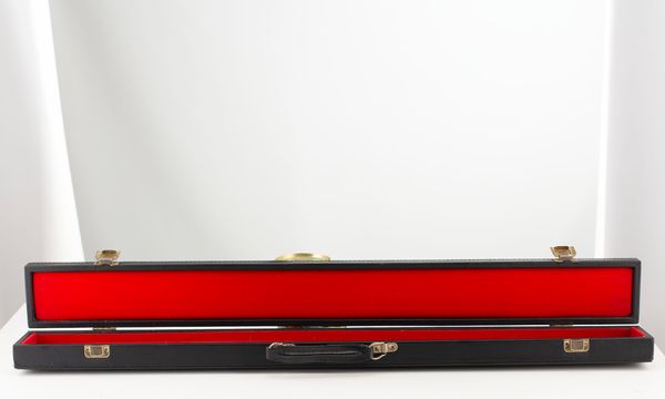 A bass bow case, branded bce