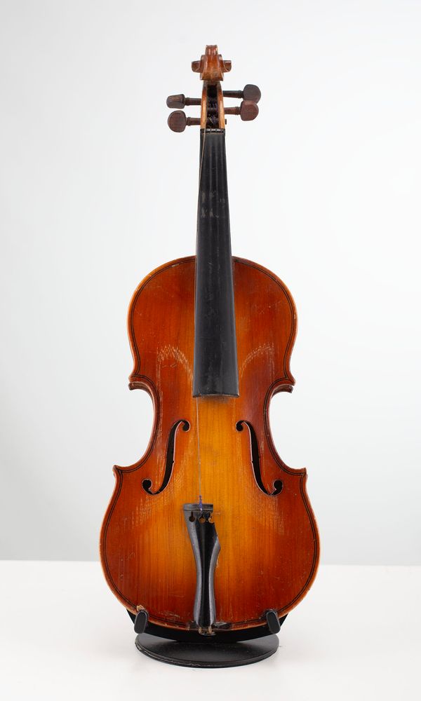Four half-sized violins, varying sizes