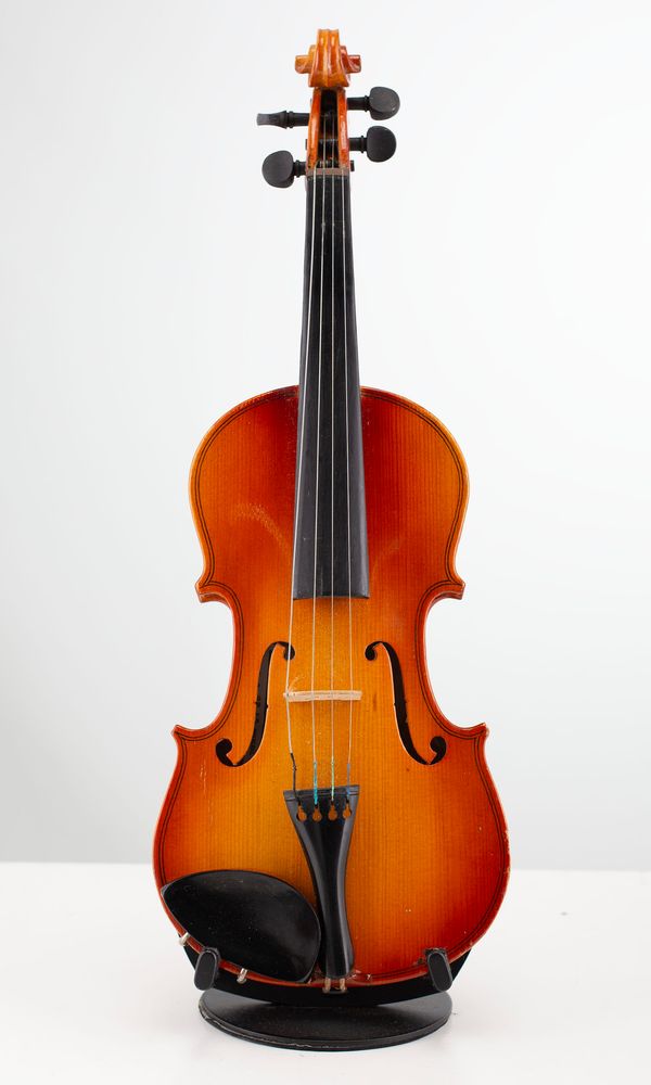 Four quarter-sized violins, varying sizes