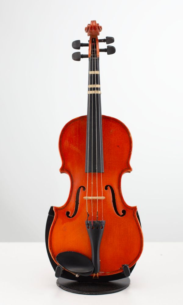 Four one-eighths sized violins, varying sizes