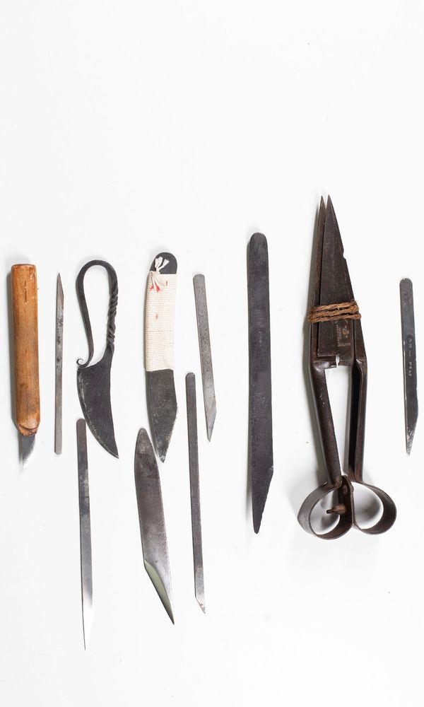 Eleven assorted cutting tools