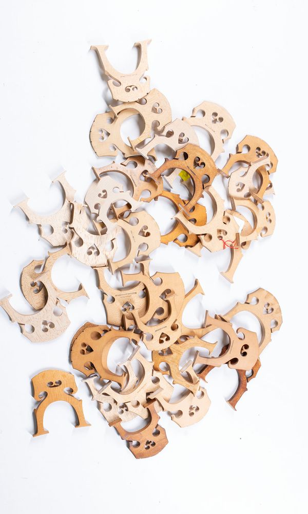 A bundle of cello bridges