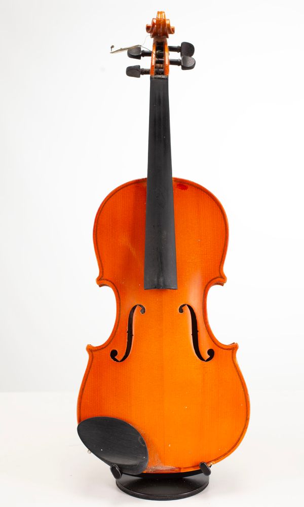 Four violins, varying sizes