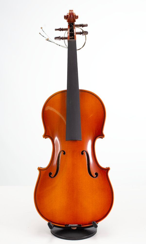 Four three-quarter sized violins, varying sizes