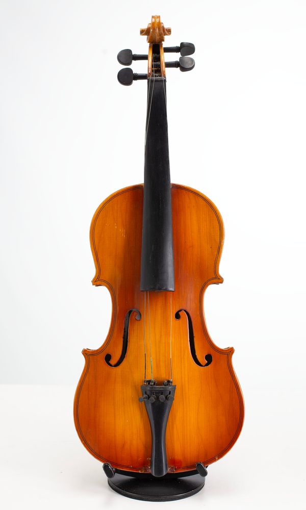 Four three-quarter sized violins, varying sizes