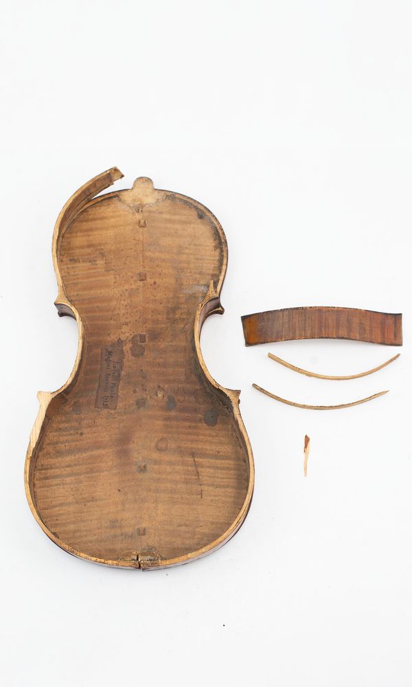 A violin, disassembled (body & scroll)
