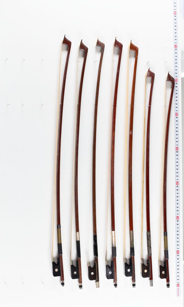 A bundle of seven bows, varying sizes